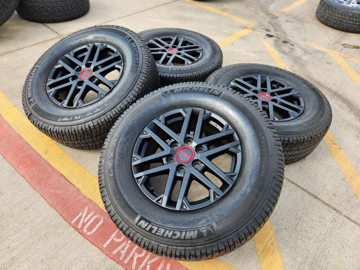 18" Toyota Tundra TRD OEM wheels rims 75281 black Sequoia LX600 tires MICHELIN