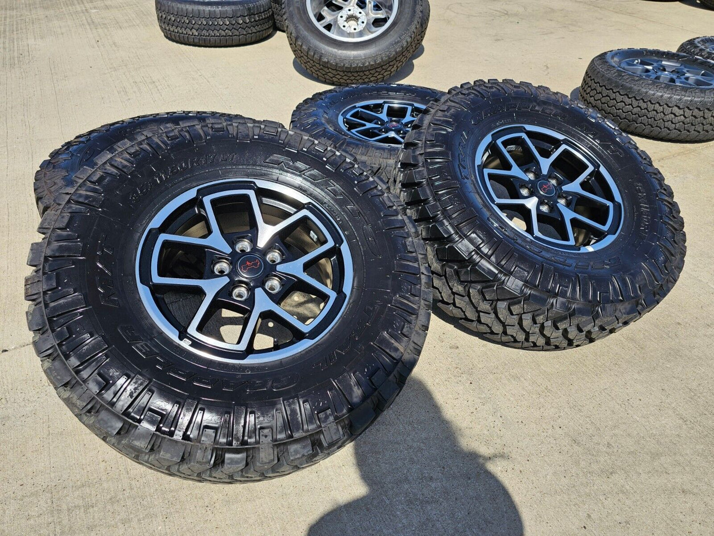 17" Jeep Wrangler Rubicon OEM wheels rims Gladiator tires NITTO 35" NEW
