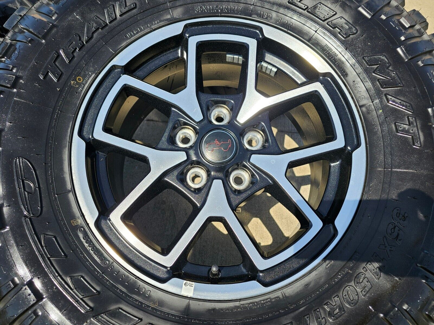 17" Jeep Wrangler Rubicon OEM wheels rims Gladiator tires NITTO 35" NEW