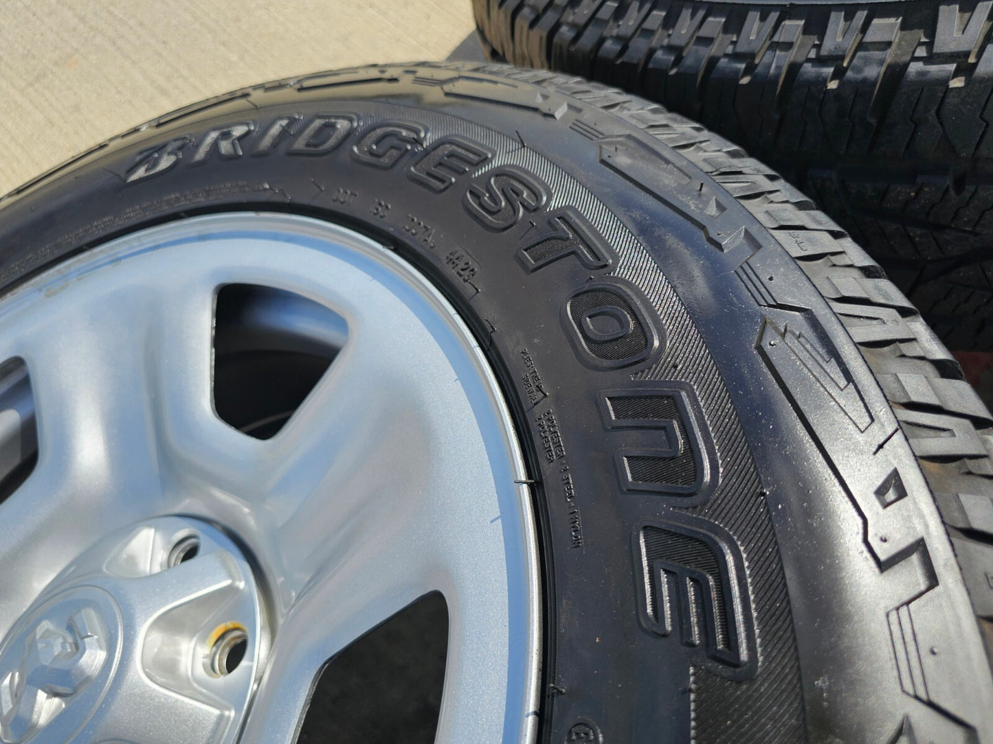 18" Dodge Ram 1500 OEM wheels rims tires BRIDGESTONE DUELER A/T NEW