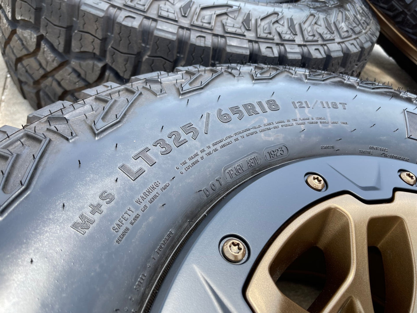 18" Dodge Ram 1500 RHO TRX Beadlock OEM bronze wheel rim 2735 tires 35" NEW