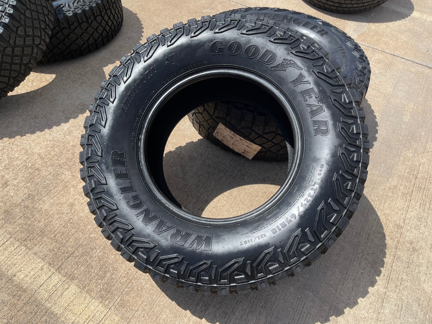 (1) 325/65/18 Goodyear Wrangler Territory M/T tire LT 8 ply load range D