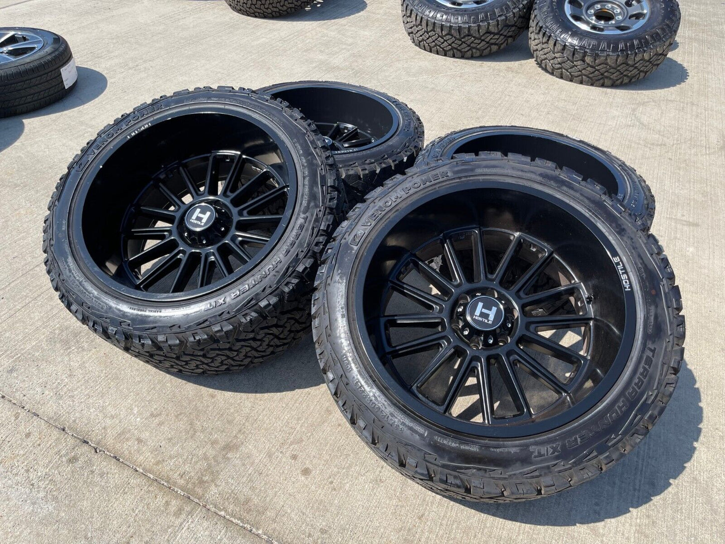 22x12 Hostile Predator Ford F-150 Expedition -44 wheels rims 6x135 tires 33"