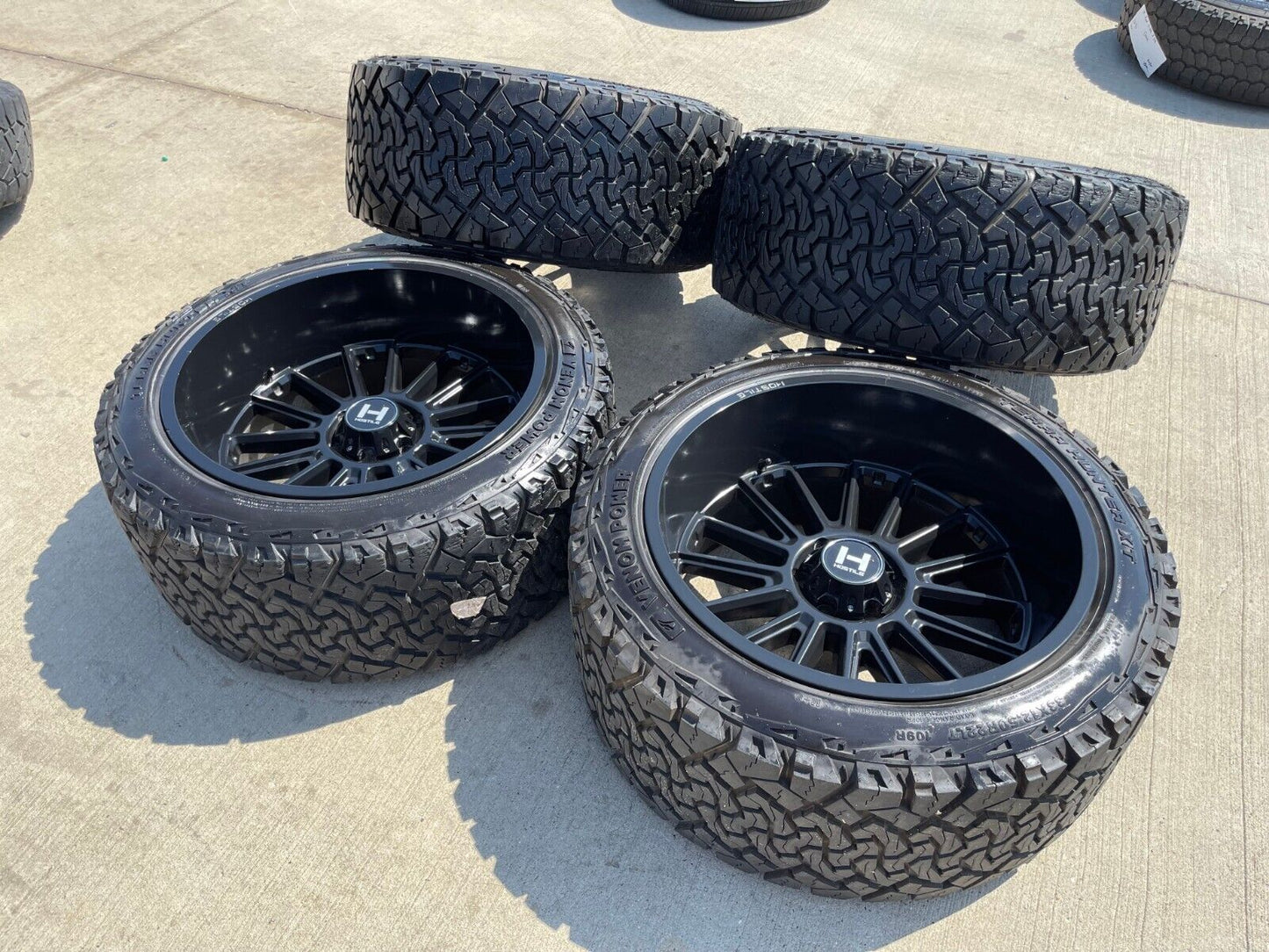 22x12 Hostile Predator Ford F-150 Expedition -44 wheels rims 6x135 tires 33"