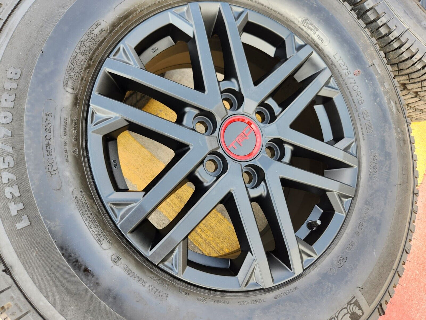 18" Toyota Tundra TRD OEM wheels rims 75281 black Sequoia LX600 tires MICHELIN