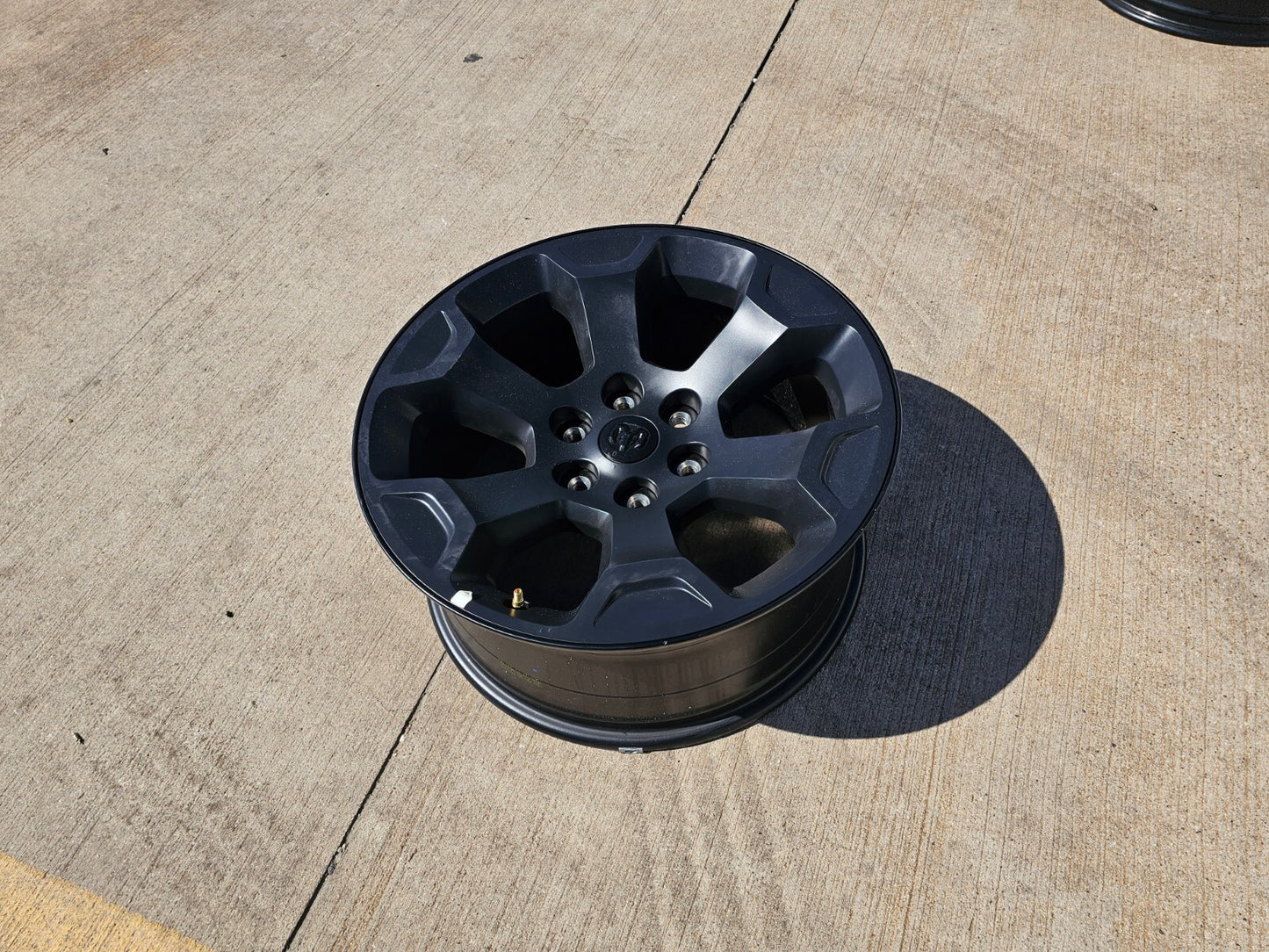 (1) 20" Dodge Ram 1500 OEM Laramie Black 2680 wheel Spare 2022 2023 2024 2025