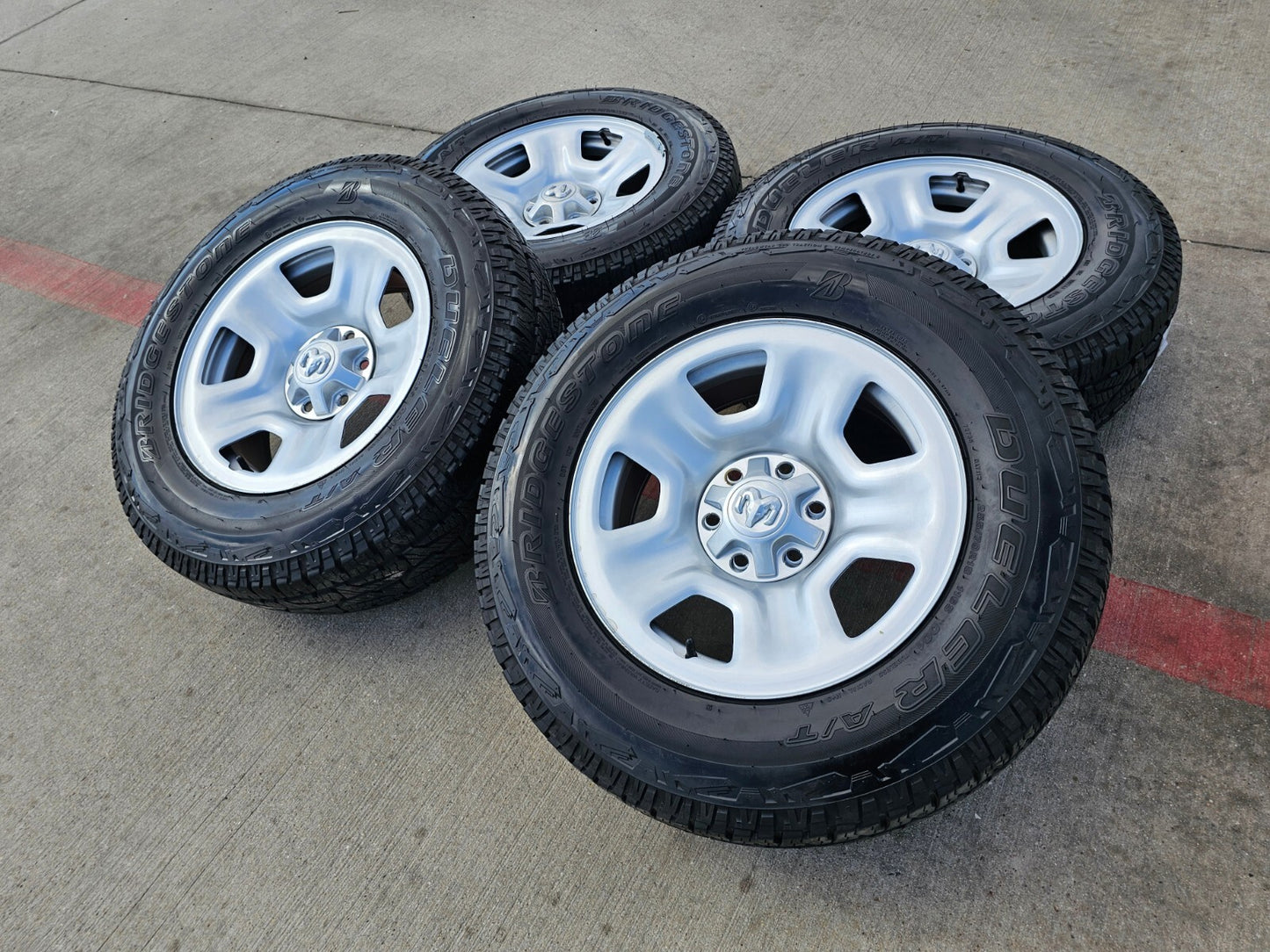18" Dodge Ram 1500 OEM wheels rims tires BRIDGESTONE DUELER A/T NEW