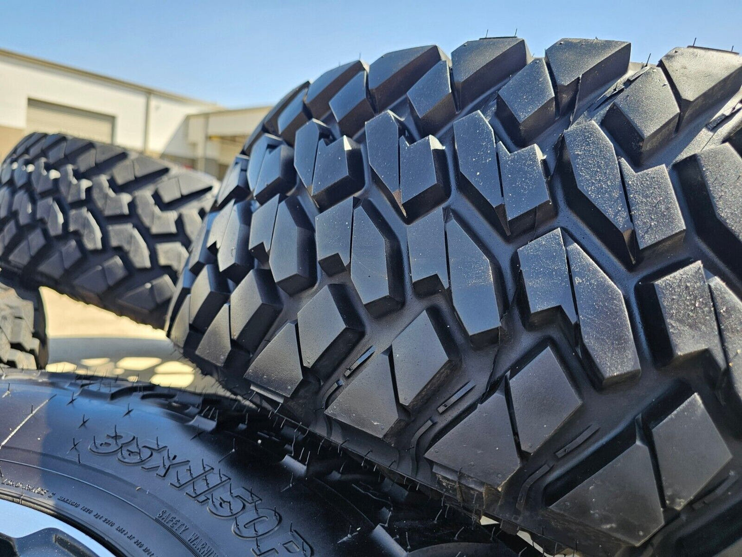 17" Jeep Wrangler Rubicon OEM wheels rims Gladiator tires NITTO 35" NEW