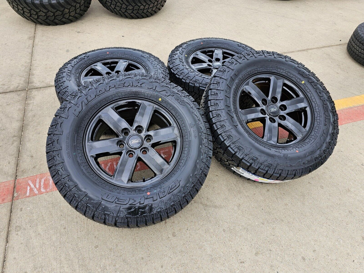 17" Ford F-150 OEM black Tremor rims wheels tires 10339 A/T4 2023 2024 2025 NEW
