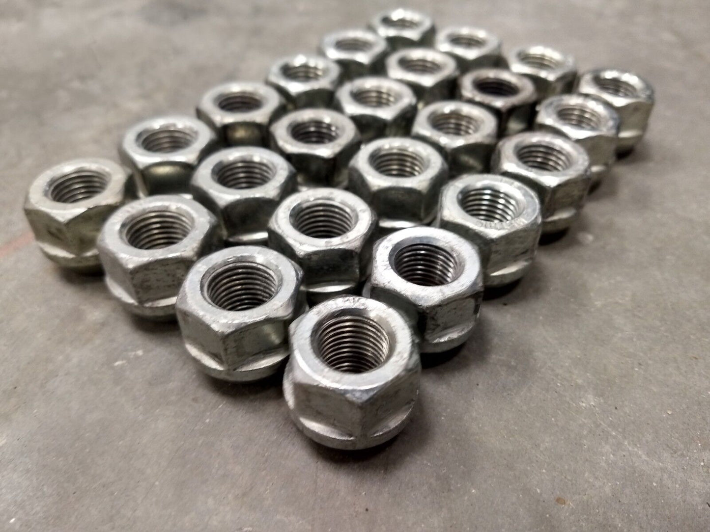 (24) OEM GM lug nuts open end 1500 Chevy Silverado GMC Cadillac 14x1.5 2017 2018