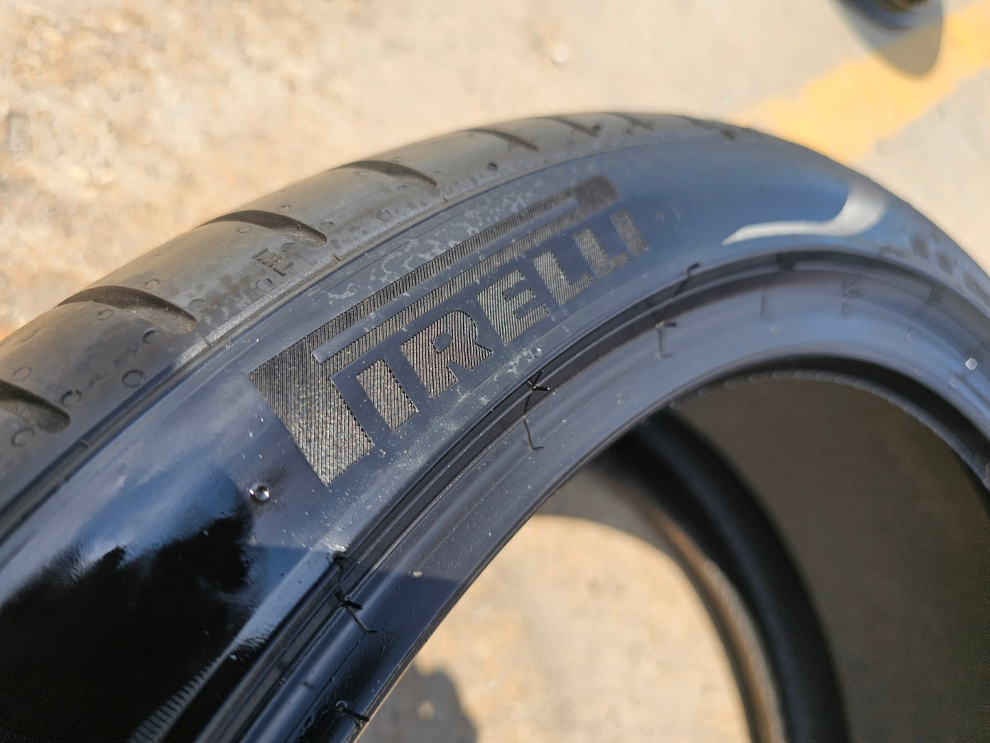 (1) 265/35/21 Pirelli P Zero tire Elect LM1 NEW take off!