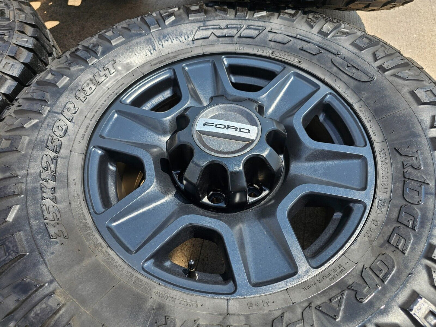 18" Ford F-250 F-350 TREMOR FX-4 OEM black wheels 10298 tires 35"