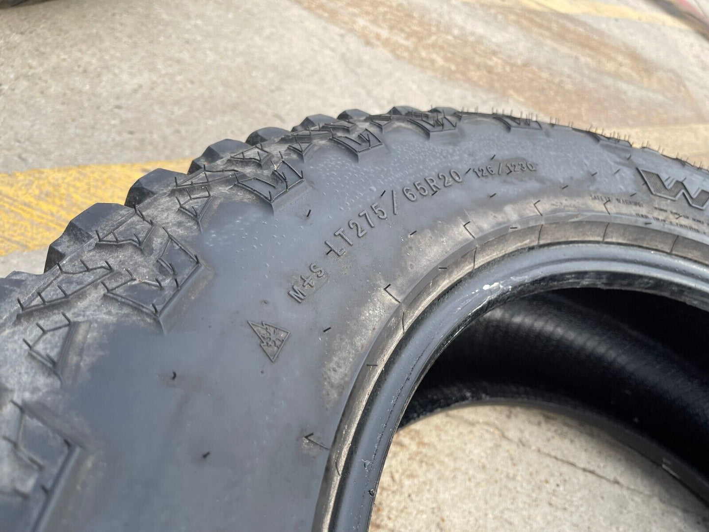 (1) 275/65/20 Goodyear Wrangler Ultra Terrain A/T tire LT 10 ply load range E