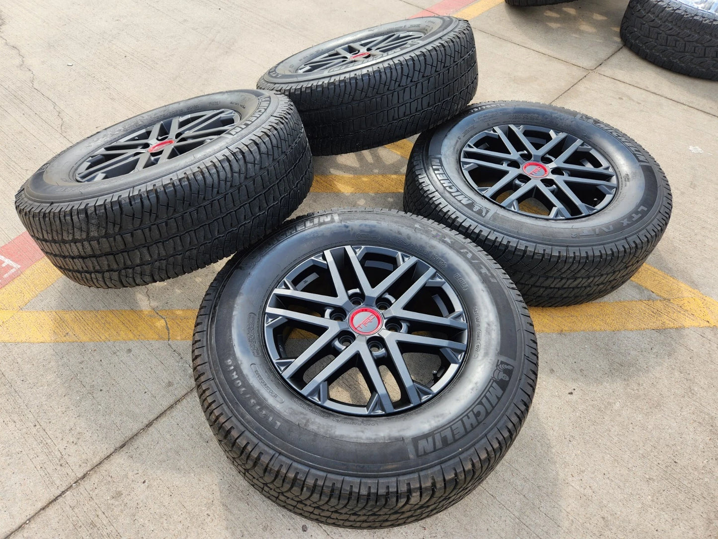 18" Toyota Tundra TRD OEM wheels rims 75281 black Sequoia LX600 tires MICHELIN