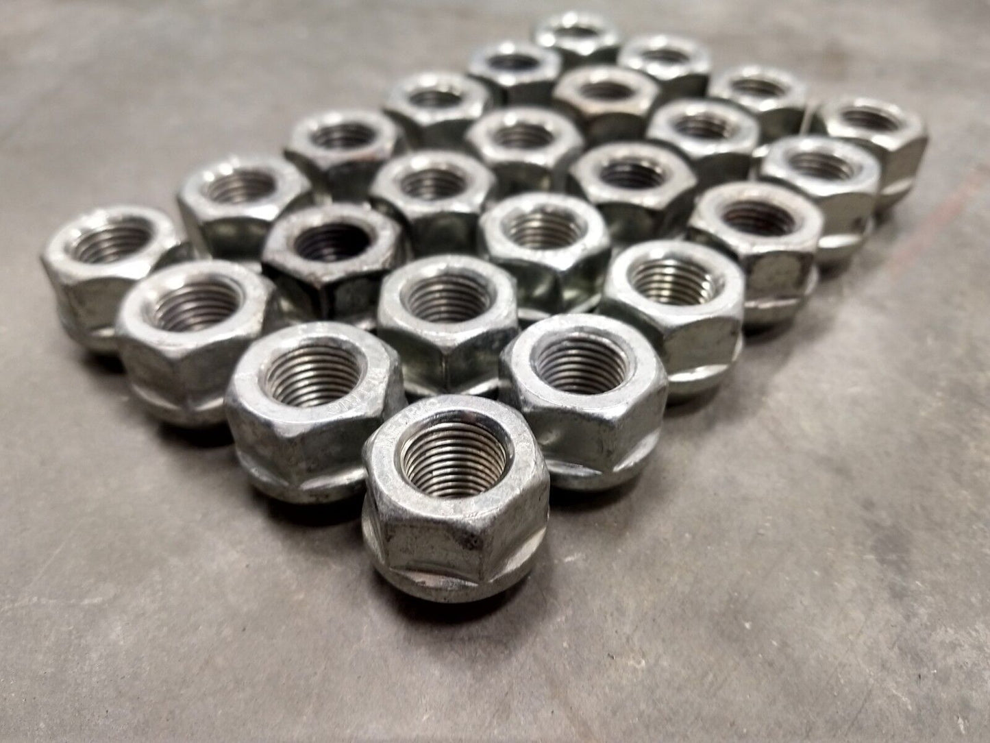 (24) OEM GM lug nuts open end 1500 Chevy Silverado GMC Cadillac 14x1.5 2017 2018