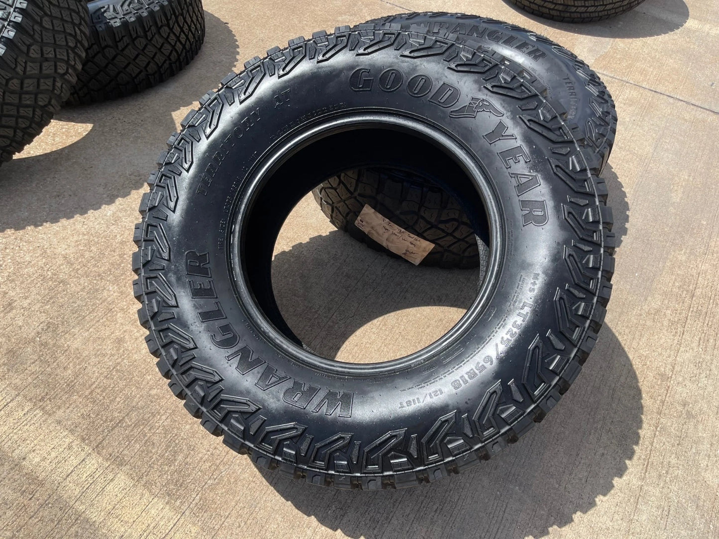(1) 325/65/18 Goodyear Wrangler Territory M/T tire LT 8 ply load range D