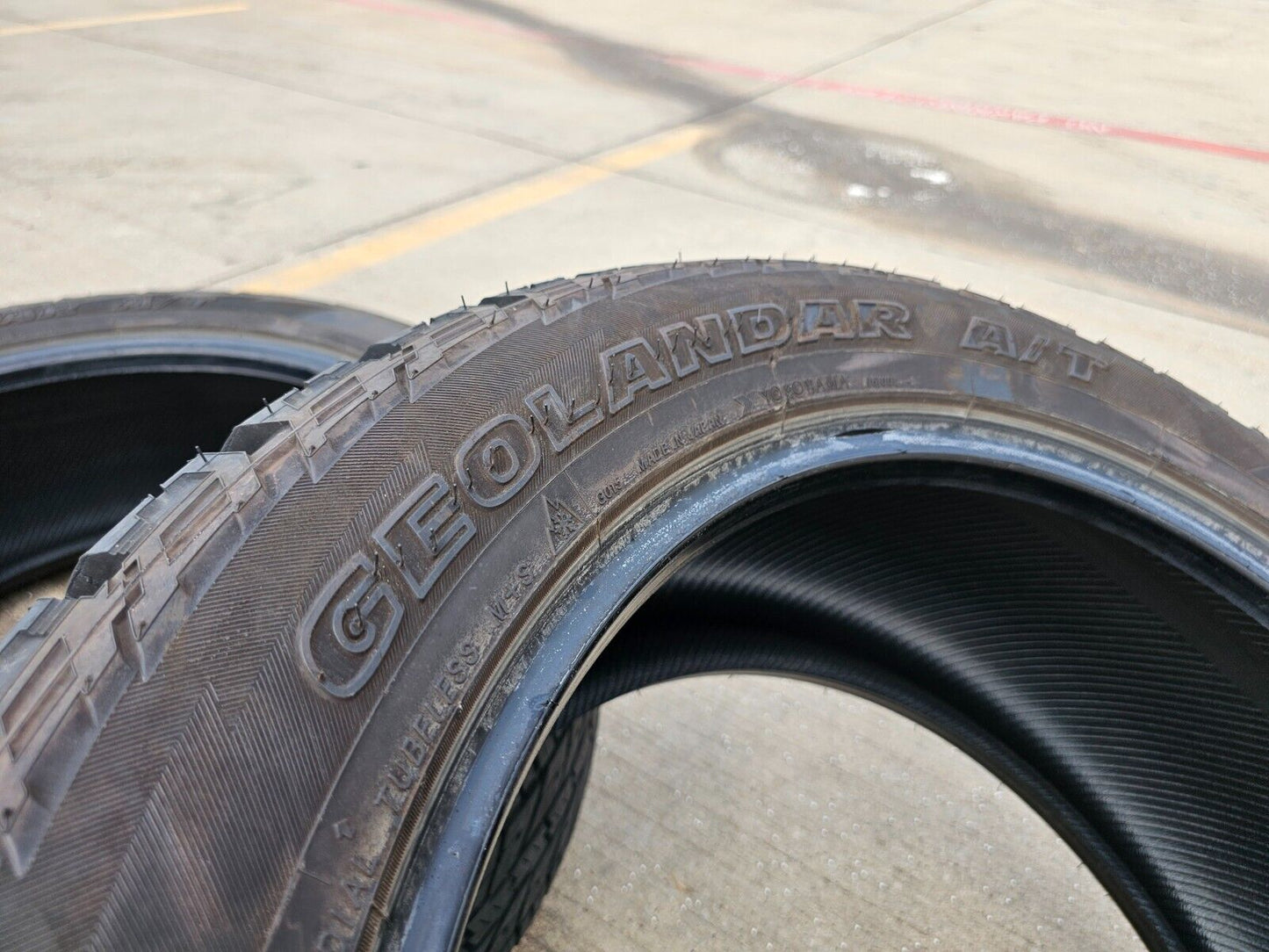 (1) 285/50/22 Yokohama Geolander A/T G015 10 Ply LT load range E
