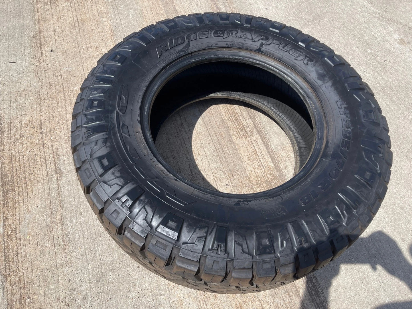 (1) 295/70/18 Nitto Ridge Grappler R/T tire 126Q E LT 10 PLY
