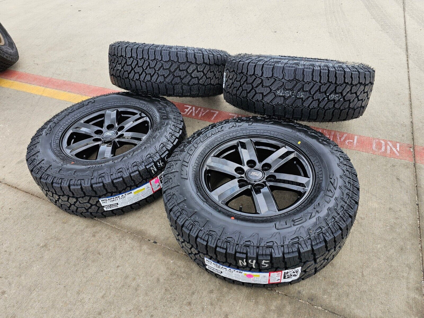 17" Ford F-150 OEM black Tremor rims wheels tires 10339 A/T4 2023 2024 2025 NEW