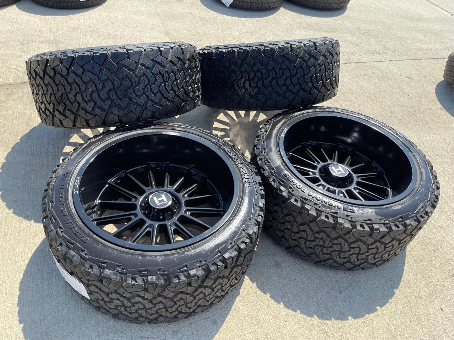 22x12 Hostile Predator Ford F-150 Expedition -44 wheels rims 6x135 tires 33"