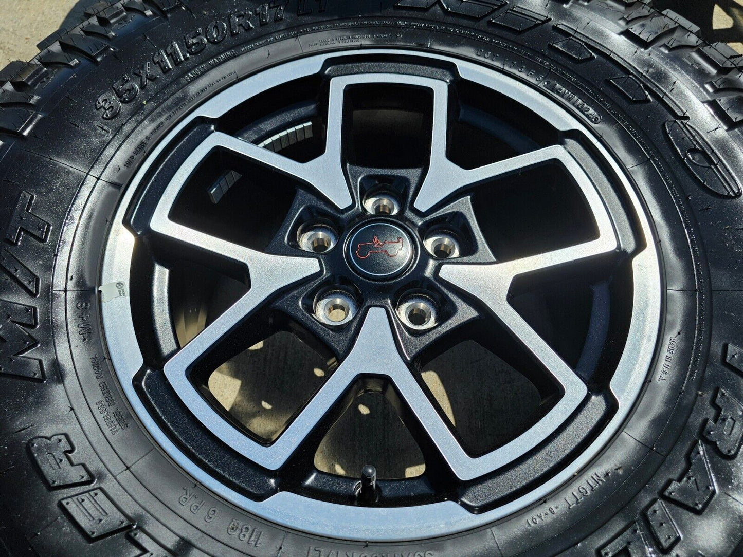 17" Jeep Wrangler Rubicon OEM wheels rims Gladiator tires NITTO 35" NEW
