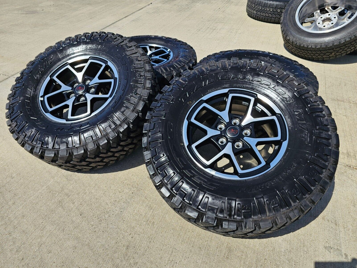 17" Jeep Wrangler Rubicon OEM wheels rims Gladiator tires NITTO 35" NEW