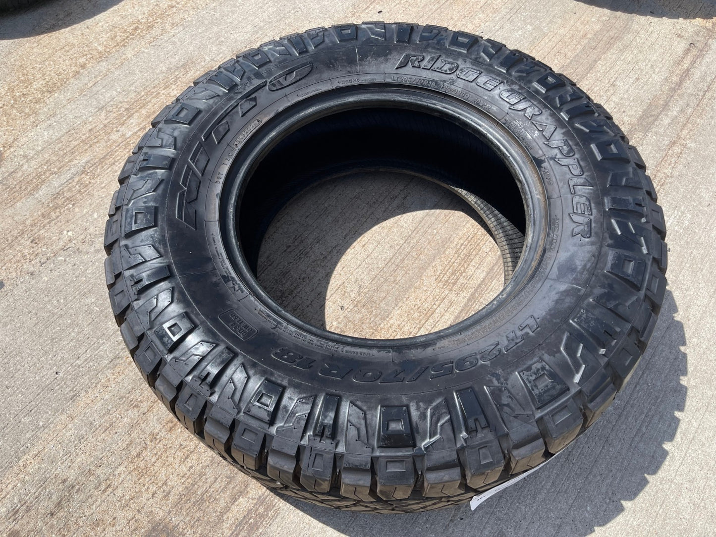 (1) 295/70/18 Nitto Ridge Grappler R/T tire 126Q E LT 10 PLY