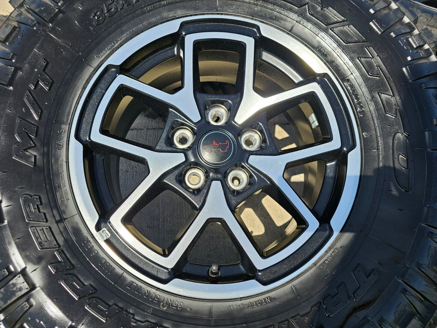 17" Jeep Wrangler Rubicon OEM wheels rims Gladiator tires NITTO 35" NEW