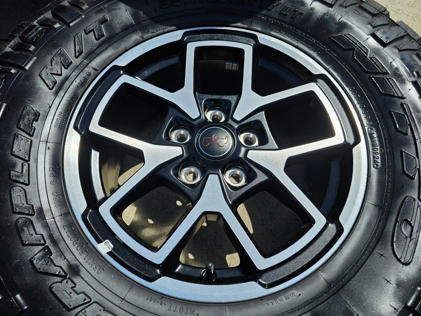 17" Jeep Wrangler Rubicon OEM wheels rims Gladiator tires NITTO 35" NEW