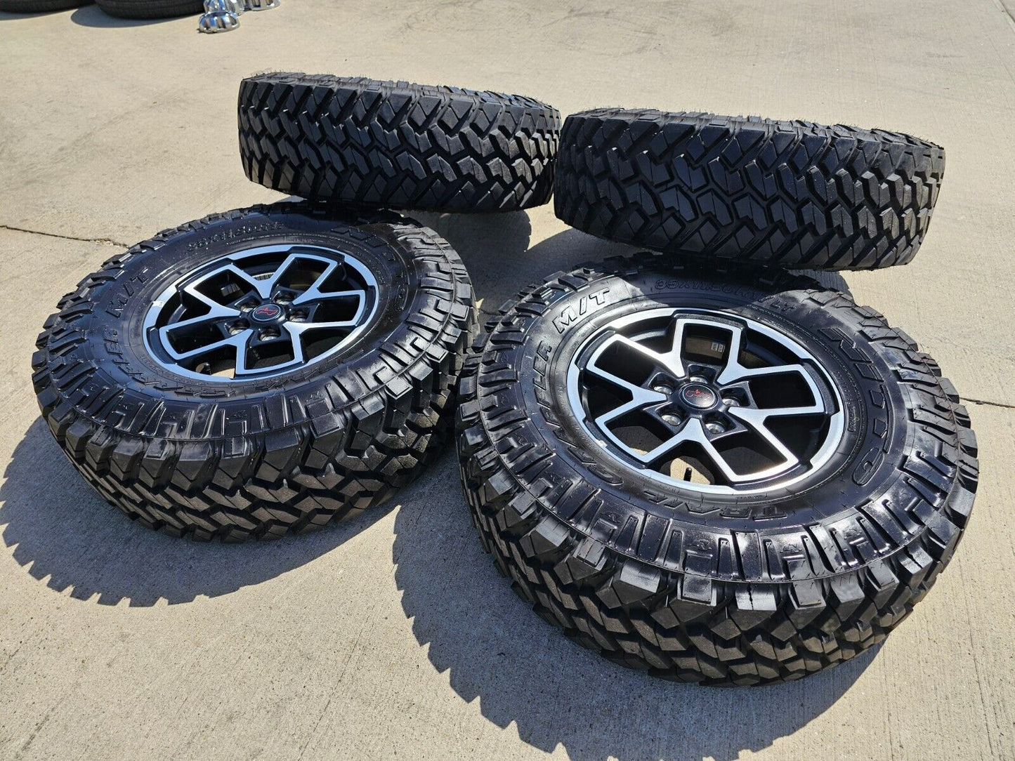17" Jeep Wrangler Rubicon OEM wheels rims Gladiator tires NITTO 35" NEW