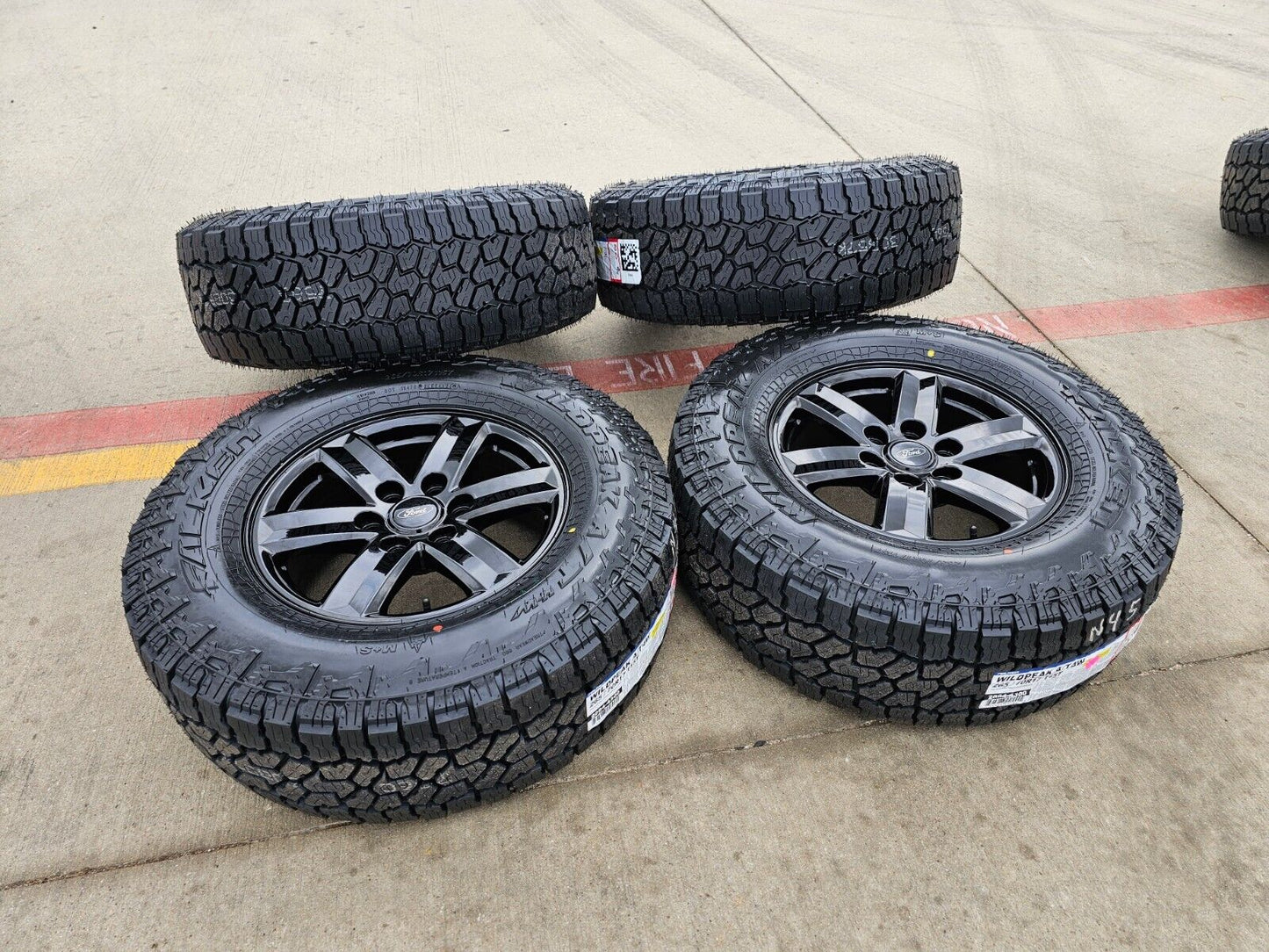 17" Ford F-150 OEM black Tremor rims wheels tires 10339 A/T4 2023 2024 2025 NEW