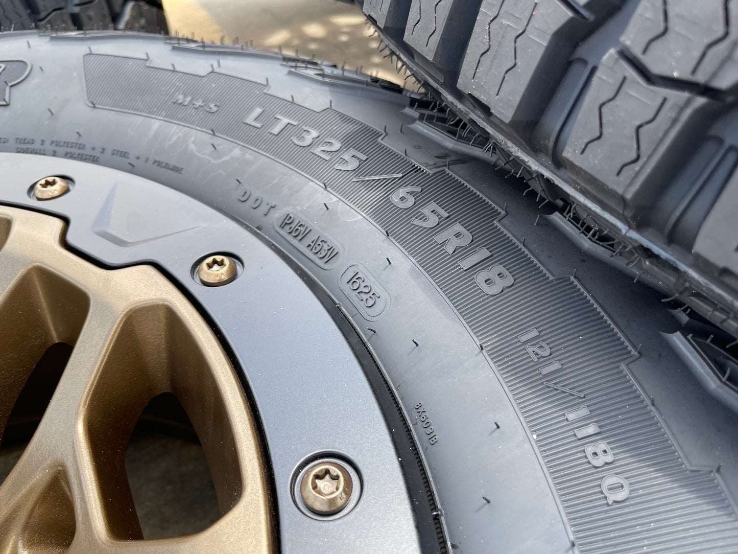 18" Dodge Ram 1500 RHO TRX Beadlock OEM bronze wheel rim 2735 tires 35" NEW