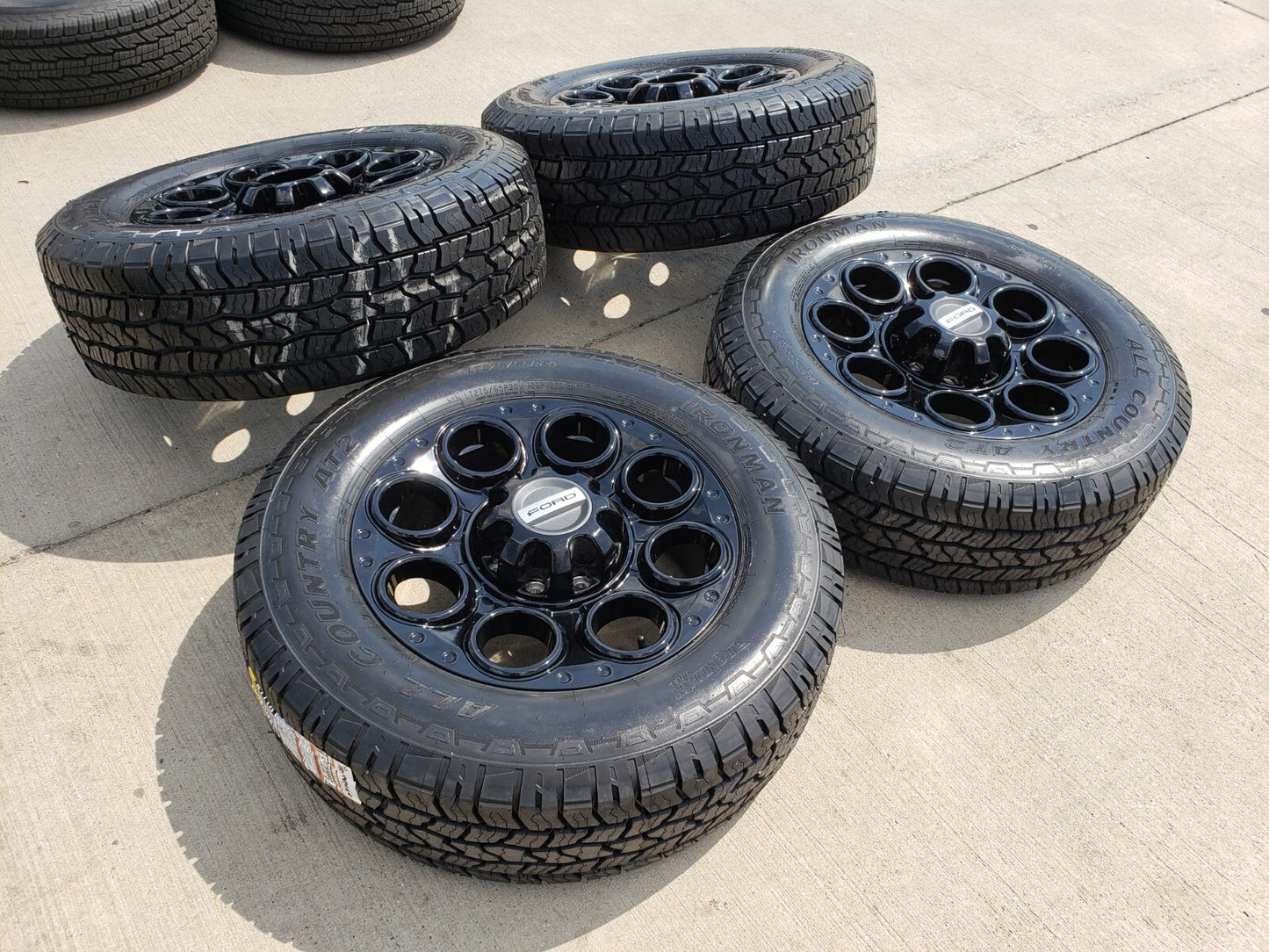 20" Ford F-250 F-350 OEM black TREMOR wheels rims 10299 10484 A/T2 tires NEW