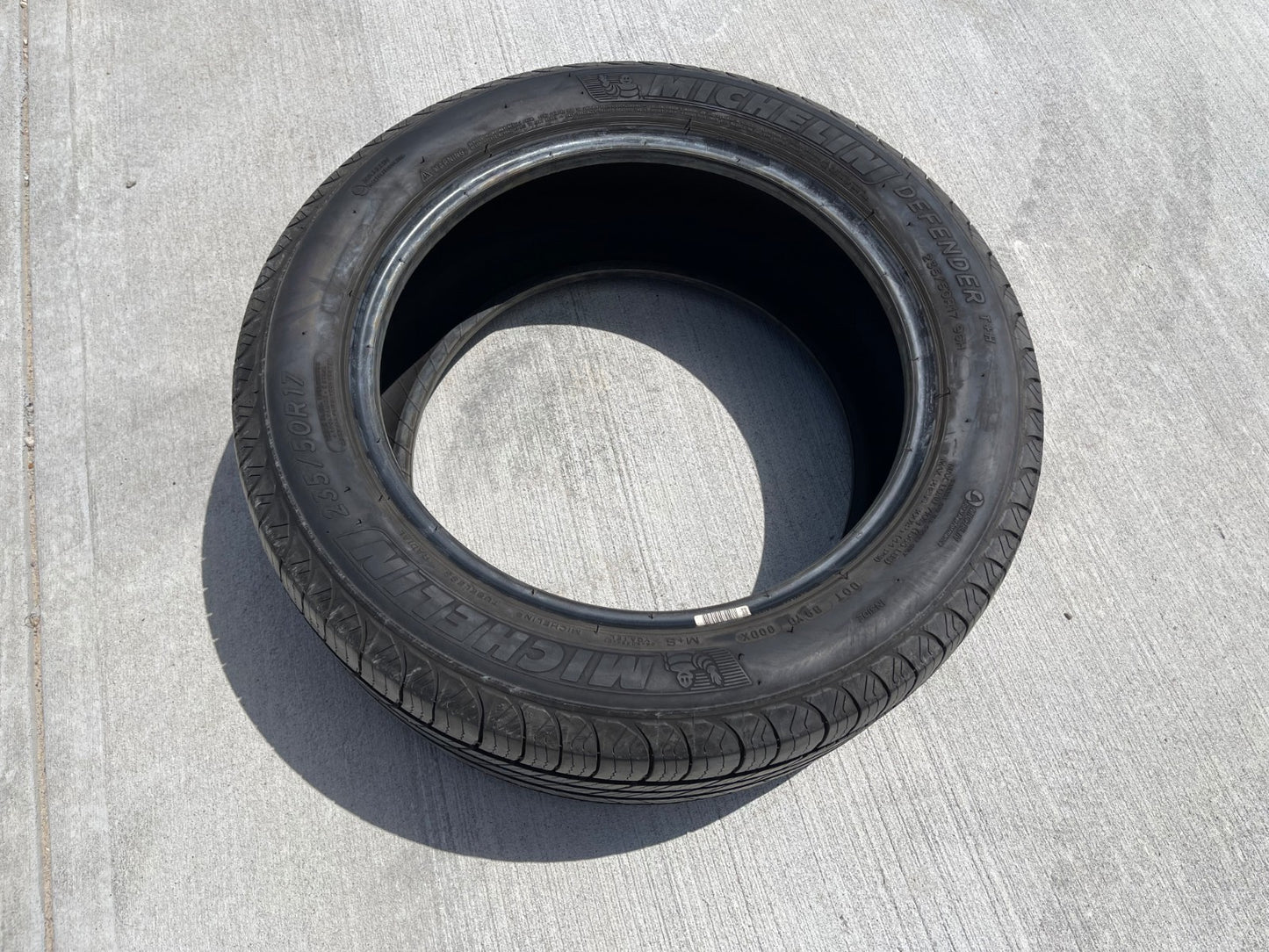 (1) 235/50/17 Michelin Defender T+H tire 235/50R17 96H XL M+S