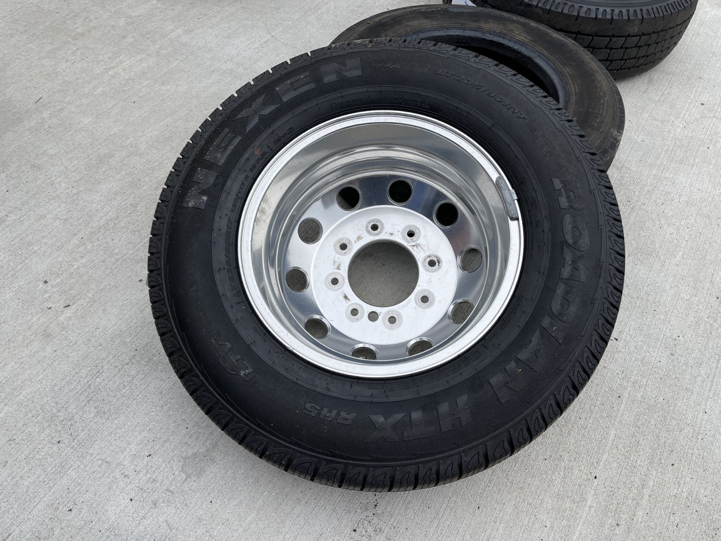 (1) 17" Dodge Ram 3500 Dually Laramie 8x200 REAR wheel rim 2702 OEM tire NEXEN