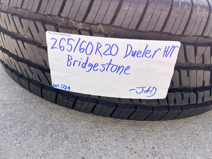 (1) 265/60/20 Bridgestone Dueler H/T tire 121R M+S 265/60R20 LT 10 ply LR E