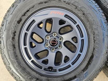 17" Nissan Frontier X-PRO OEM Desert Runner wheels rims tires DUELER A/T