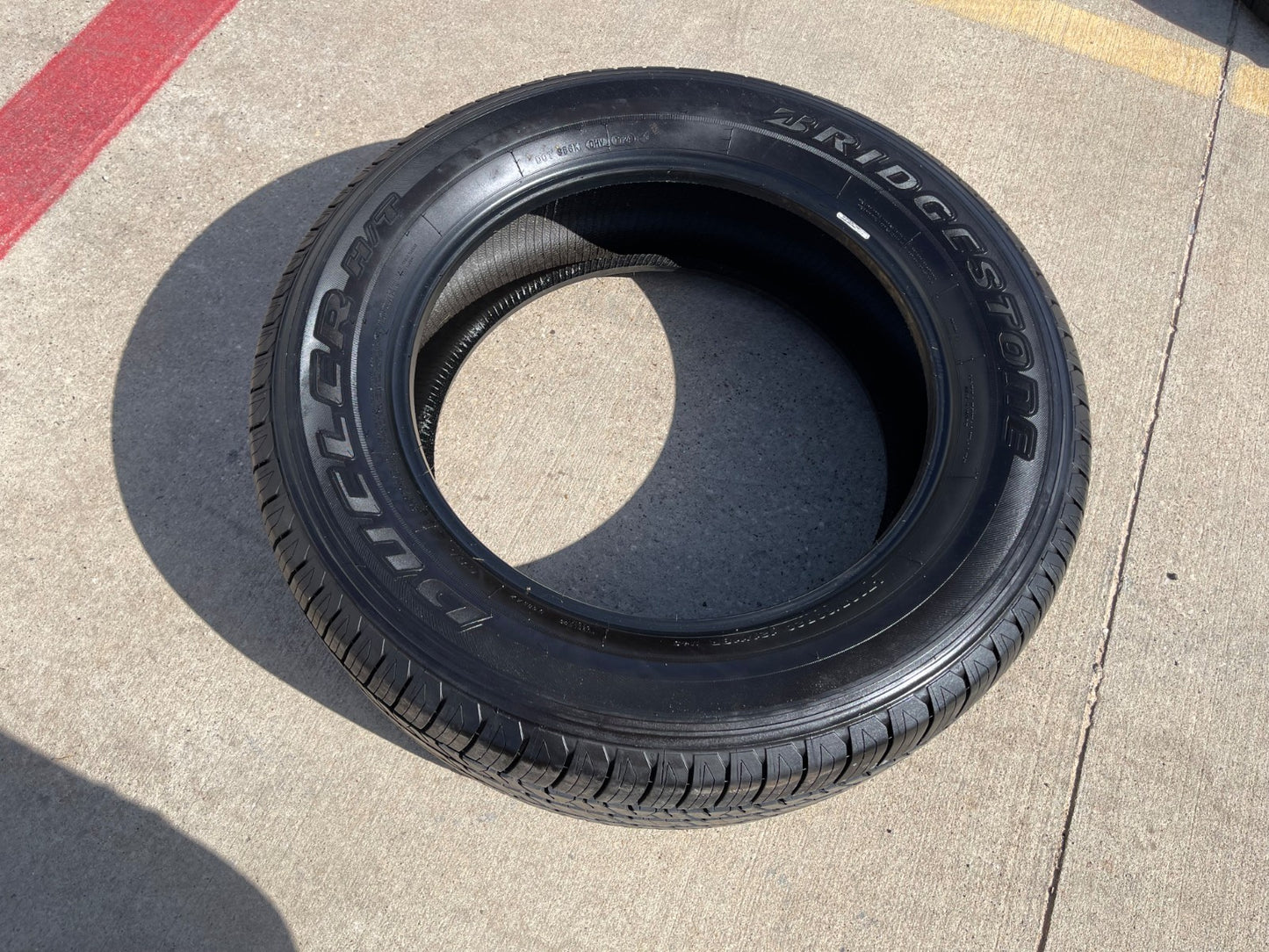 (1) 265/60/20 Bridgestone Dueler H/T tire 121R M+S 265/60R20 LT 10 ply LR E