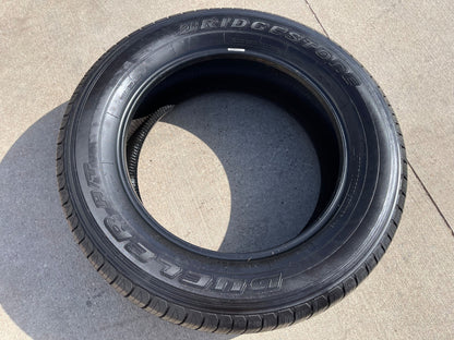 (1) 265/60/20 Bridgestone Dueler H/T tire 121R M+S 265/60R20 LT 10 ply LR E