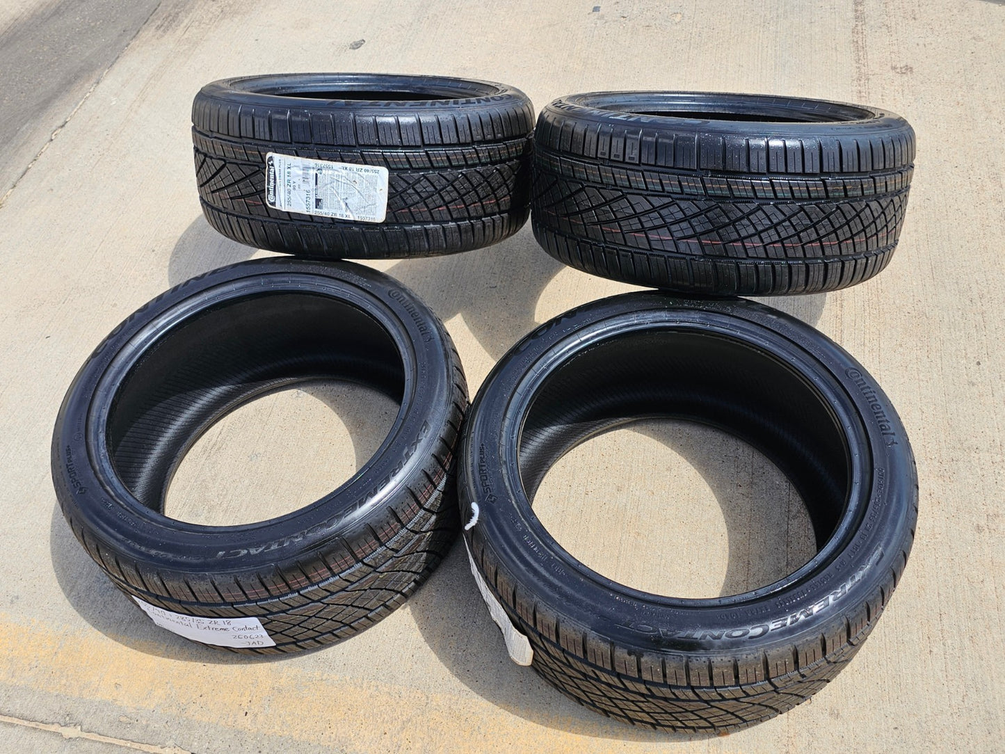 (2) 255/40/18 + (2) 285/35/18 Continental Extreme Contact tires 99Y M+S XL NEW