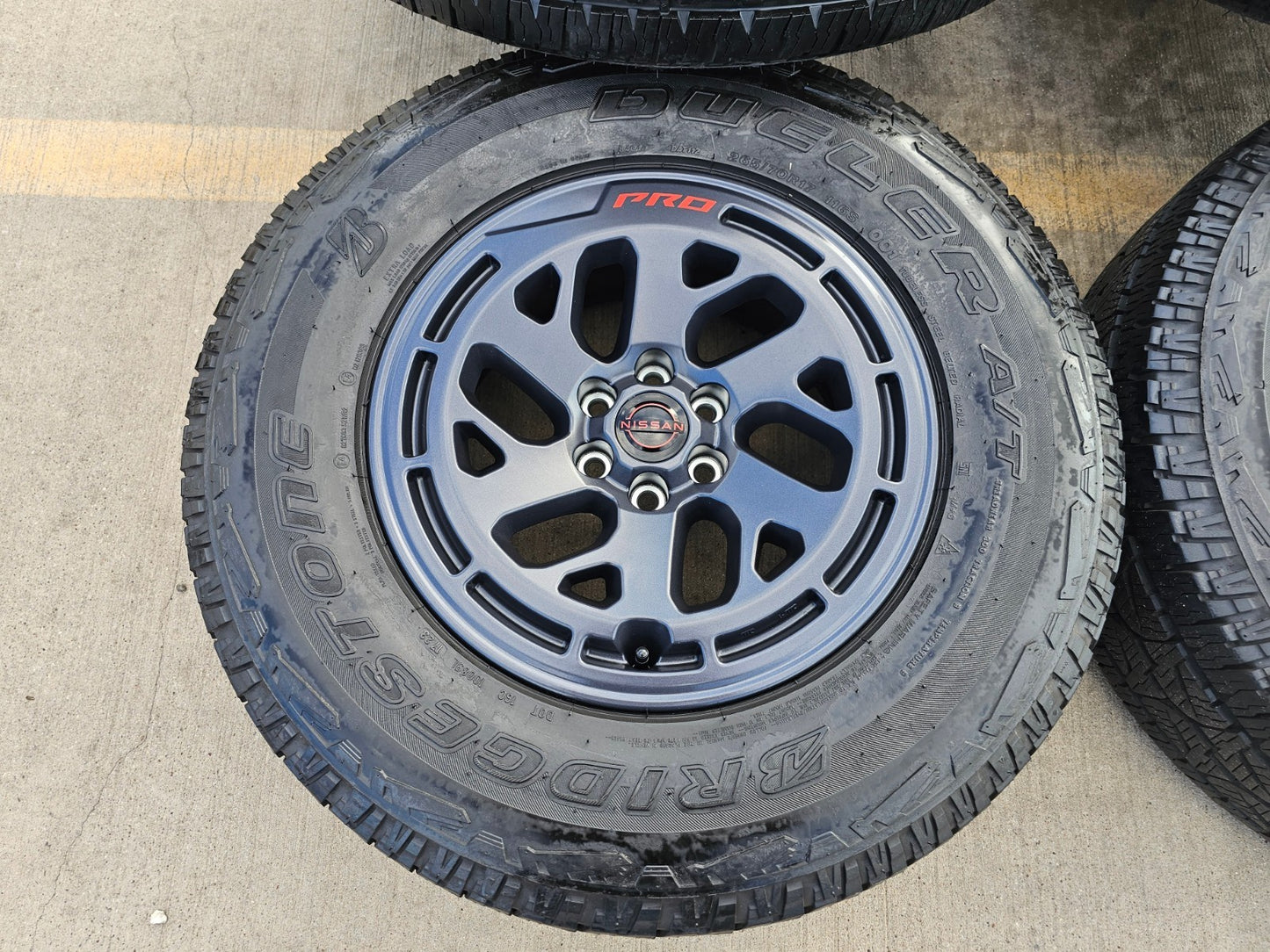 17" Nissan Frontier X-PRO OEM Desert Runner wheels rims tires DUELER A/T