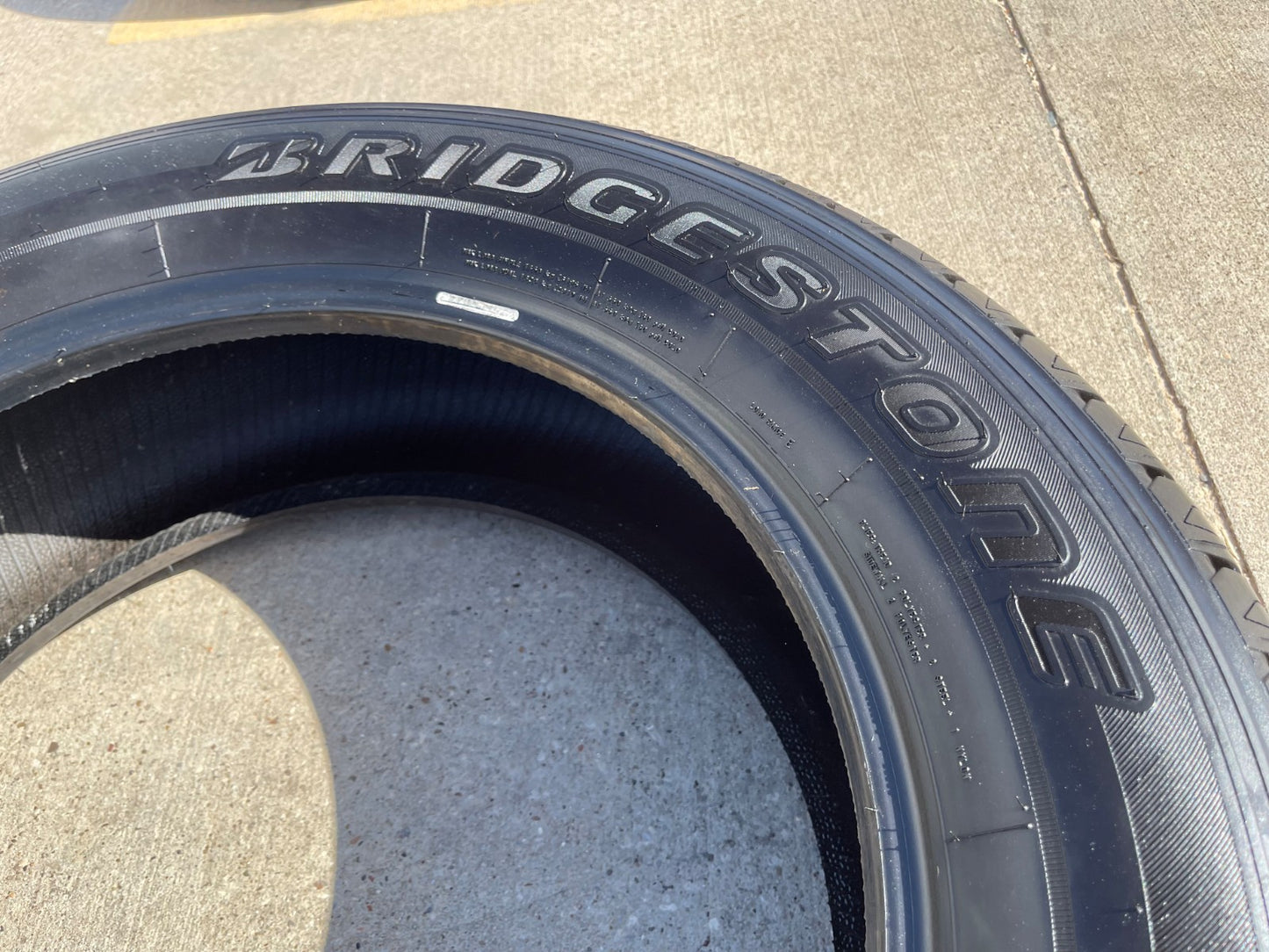 (1) 265/60/20 Bridgestone Dueler H/T tire 121R M+S 265/60R20 LT 10 ply LR E