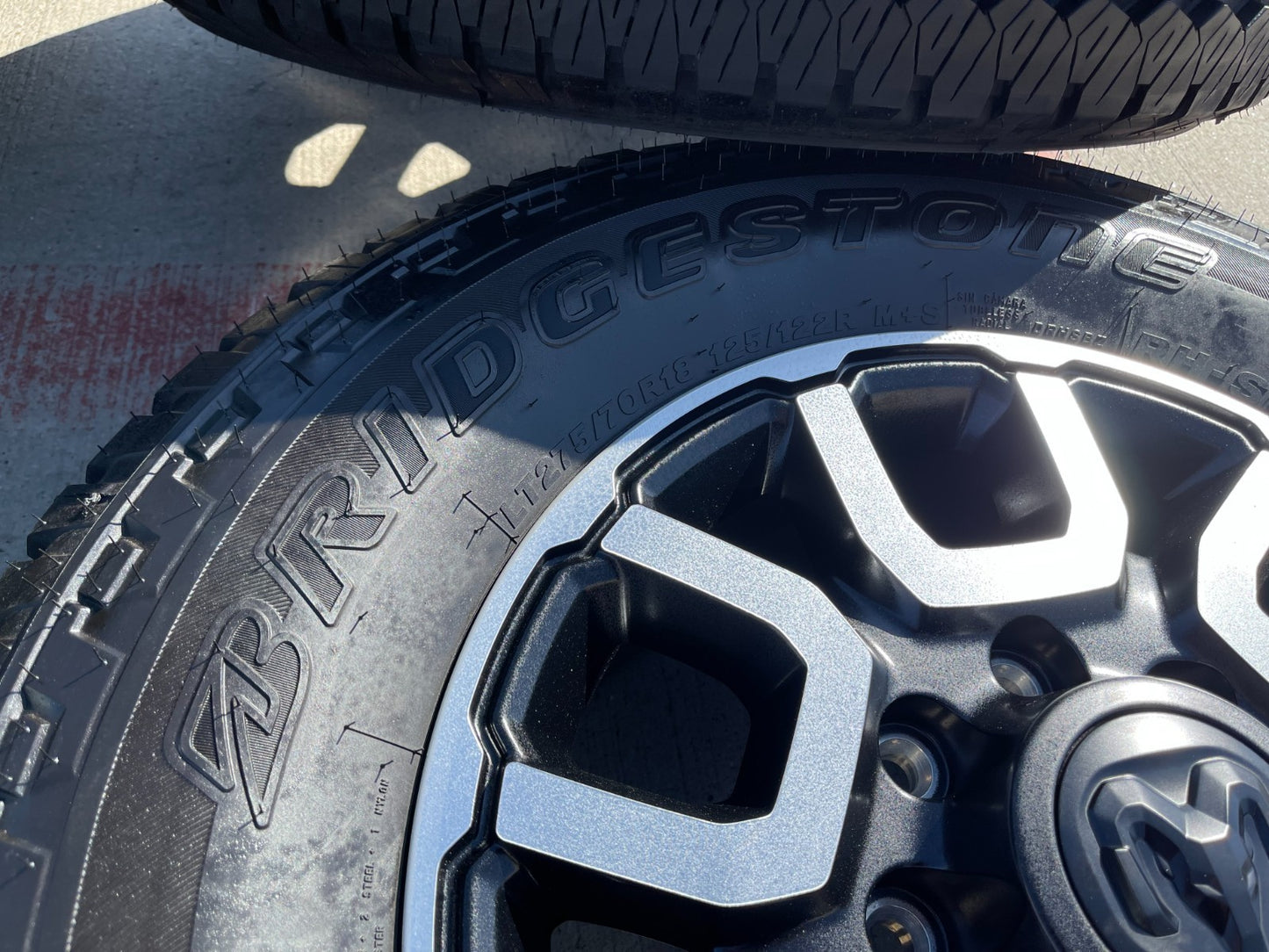 18" Ram 2500 3500 LARAMIE OEM wheels rims 2694 tires BRIDGESTONE A/T NEW 2026