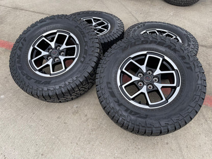 17" Jeep Wrangler Rubicon OEM 95730 9327 wheels rims Gladiator FALKEN A/T 33"