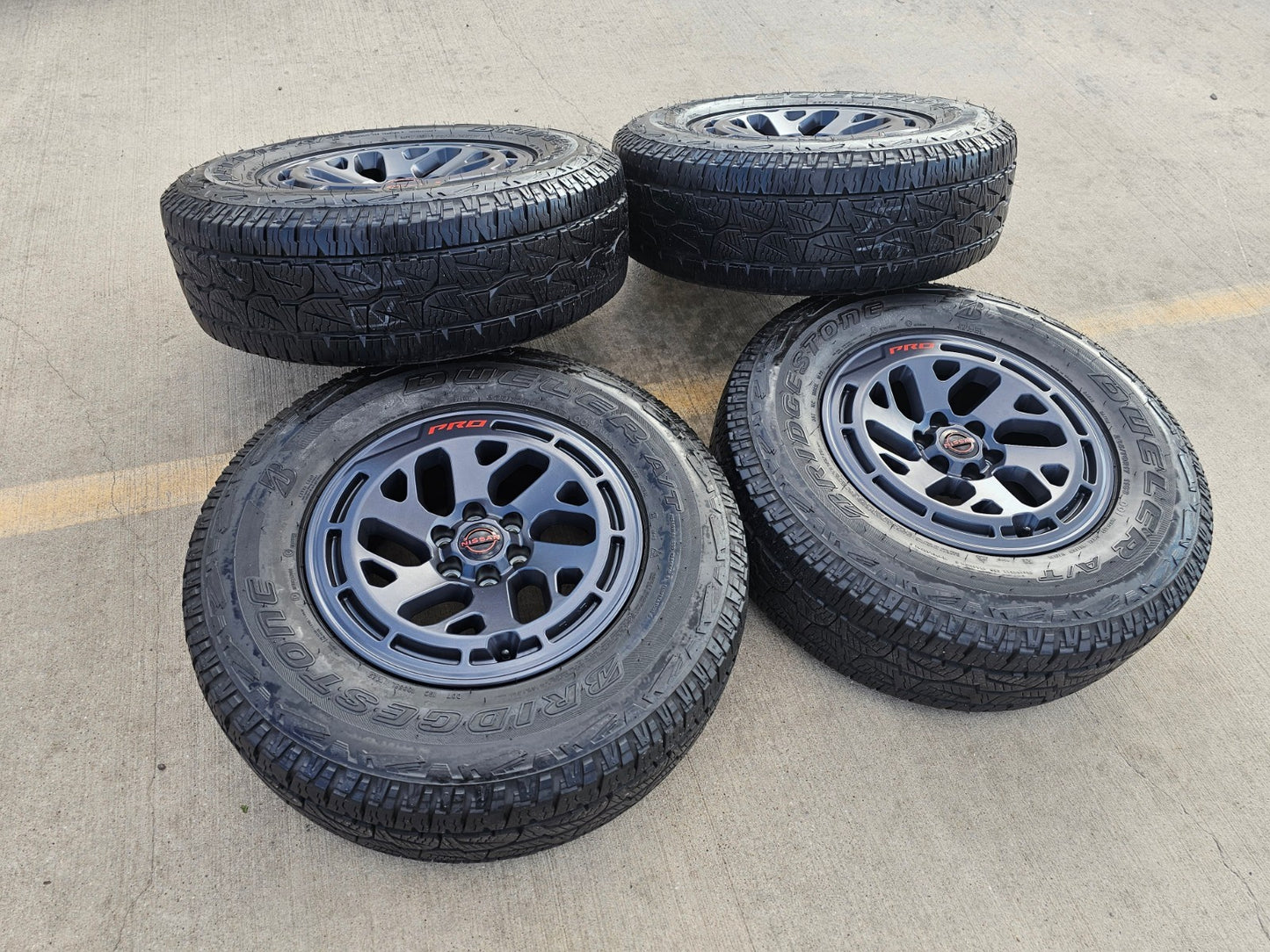 17" Nissan Frontier X-PRO OEM Desert Runner wheels rims tires DUELER A/T