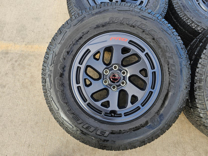 17" Nissan Frontier X-PRO OEM Desert Runner wheels rims tires DUELER A/T