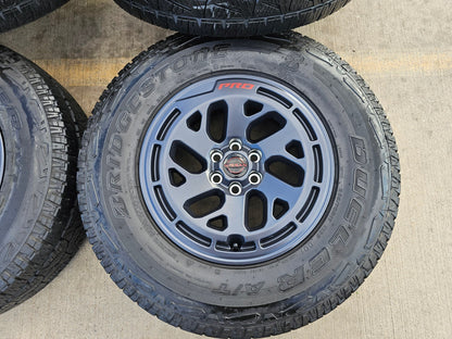 17" Nissan Frontier X-PRO OEM Desert Runner wheels rims tires DUELER A/T