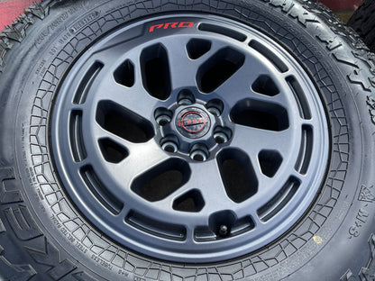 17" Nissan Frontier X-PRO OEM 62270 Desert Runner wheels rims FALKEN A/T4 NEW