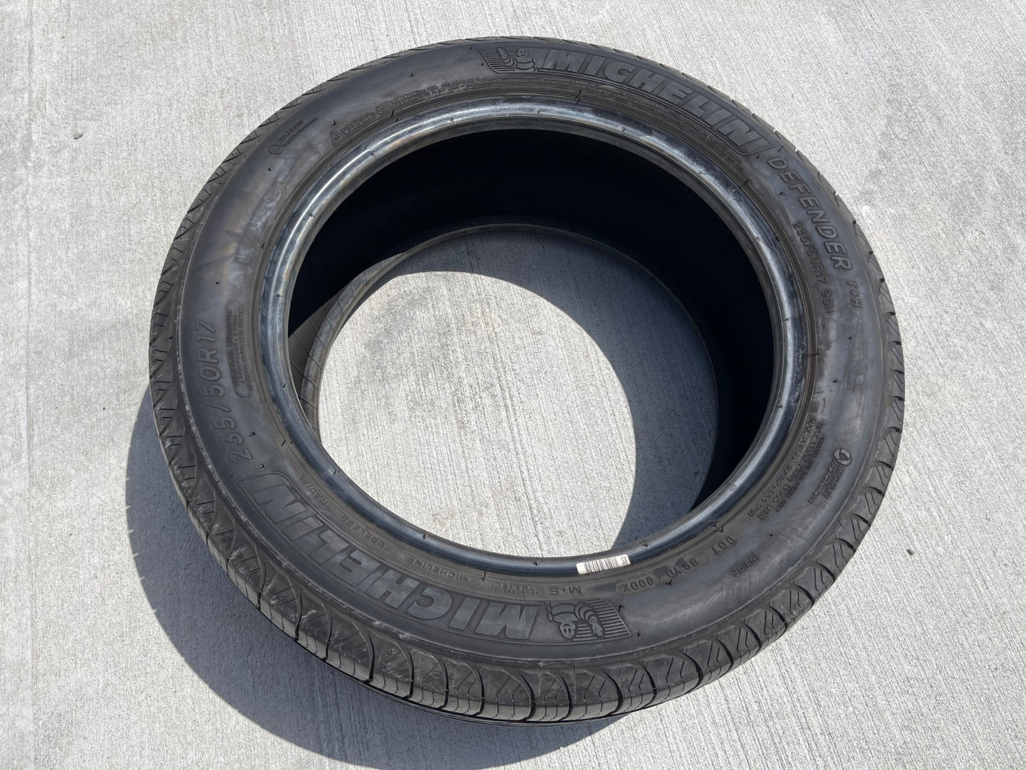 (1) 235/50/17 Michelin Defender T+H tire 235/50R17 96H XL M+S