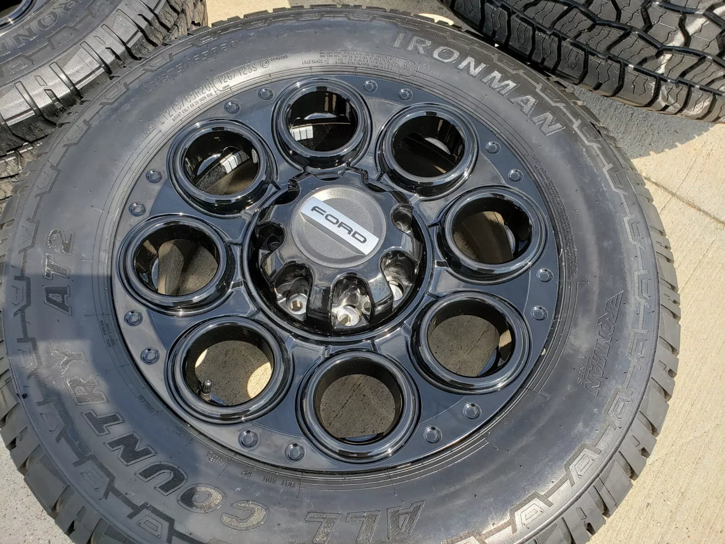20" Ford F-250 F-350 OEM black TREMOR wheels rims 10299 10484 A/T2 tires NEW